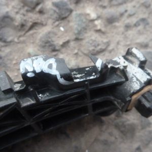 mensula soporte toyota rav4 2010 bajo foco trasera chofer daños