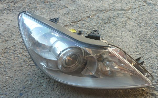 Foco optico genesis sedan 2008 2013 halogeno copiloto daños
